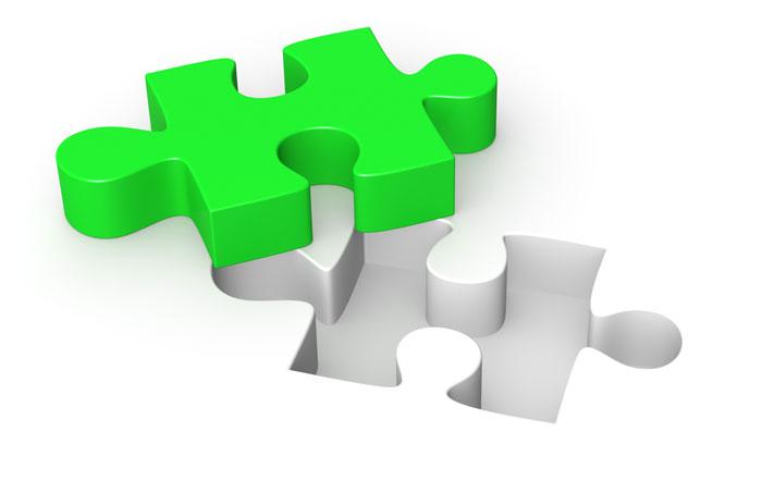 Puzzle-teile als Symbol für die perfekt-passende Lösungen